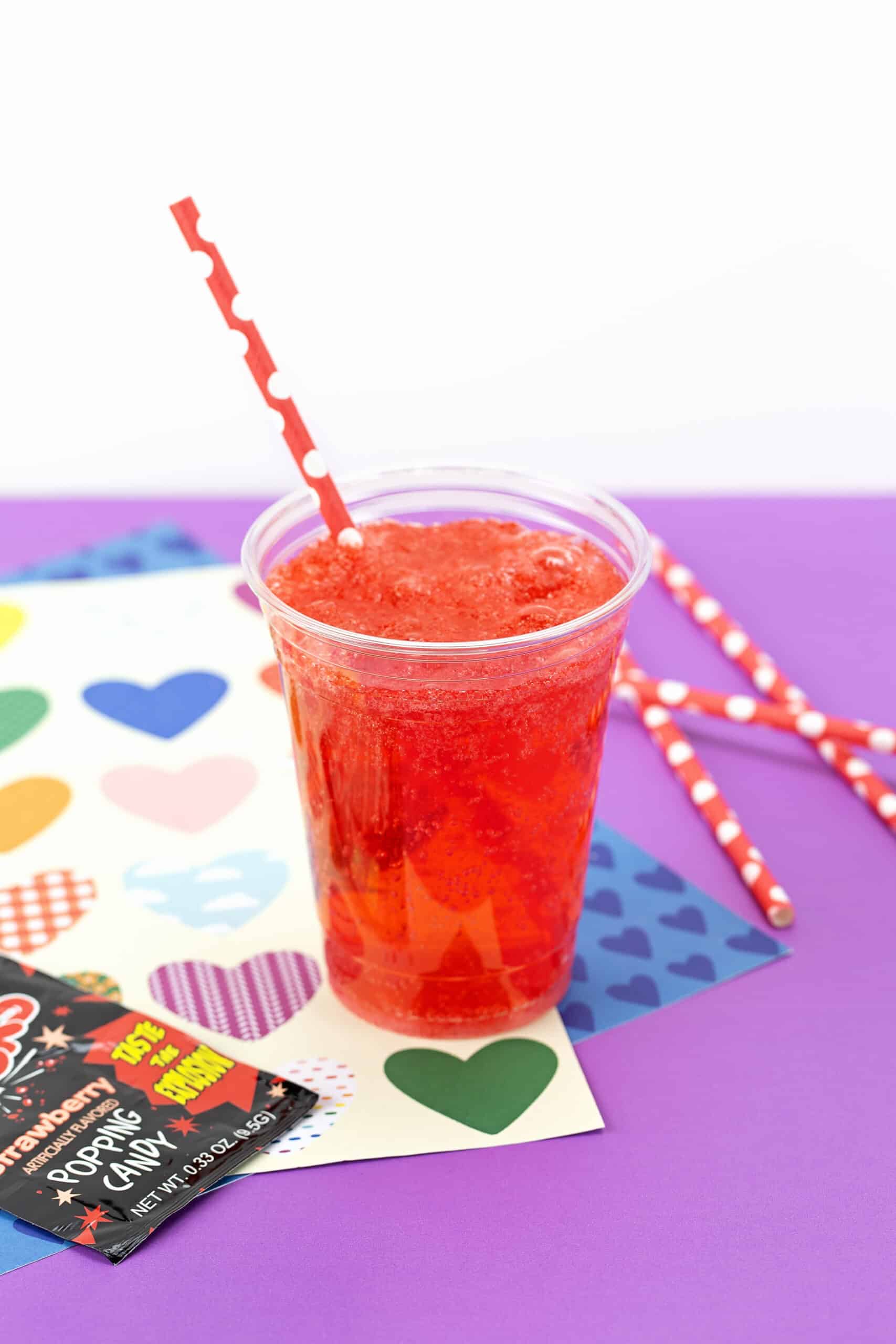 This no mess, four ingredient Poppin' Love Potion drink recipe is one of the best Valentine’s Day activities for kids! Watch this magic potion drink fizz and bubble when you add the secret ingredients! Includes a step-by-step video tutorial for your classroom Valentine's Day party!