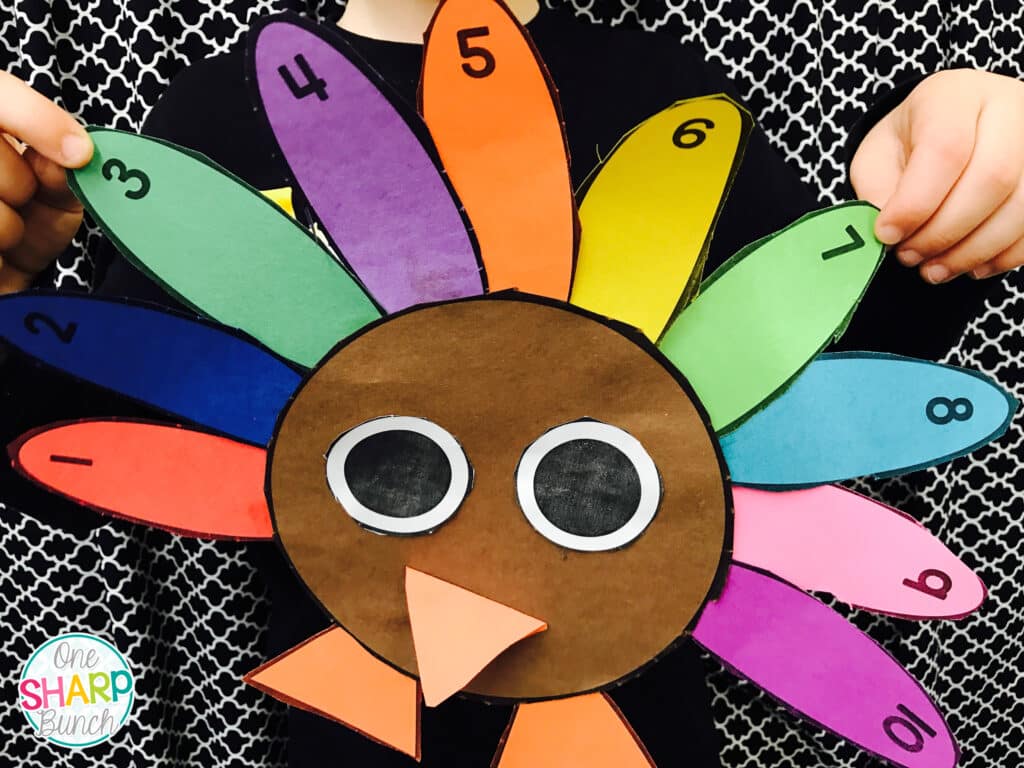 Use a number line with these turkey math activities to help build number sense, as well as develop gross and fine motor skills, this fall! These turkey games are perfect for your preschool, pre-k, kindergarten and 1st grade Thanksgiving party. Instant engagement with these Thanksgiving games!