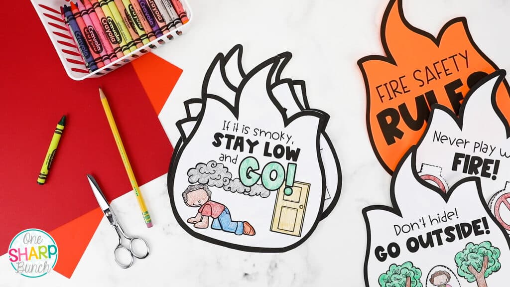 Celebrate fire safety week or fire prevention month with these interactive fire safety rules, fire safety activities and fire safety crafts for preschool, pre-k and kindergarten! #firesafety #firesafetyweek #firesafetyprevention #fireprevention #firesafetycrafts #preschool #kindergarten #firstgrade