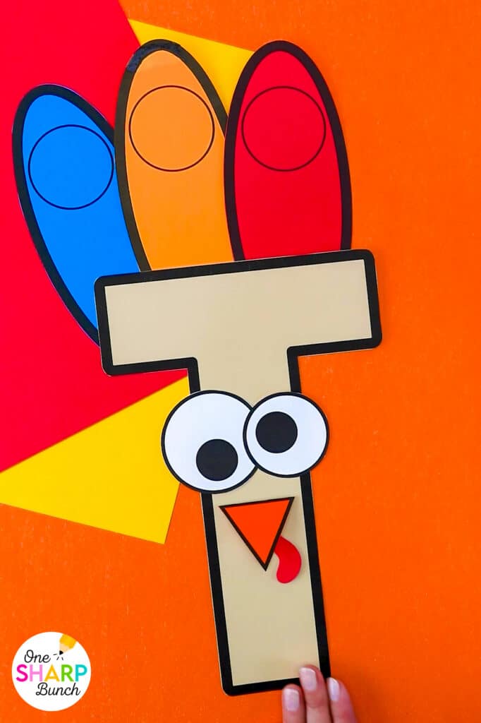Reinforce beginning sounds while strengthening fine motor skills with this adorable T is for Turkey craft and activities for preschool and kindergarten! Complete the T is for Turkey pocket chart sort before playing the beginning sound game as a literacy center. Then assemble the adorable T is for Turkey craft which is great for working on scissor cutting skills and gluing skills. Your students will love identifying beginning sounds with this Thanksgiving craft for kids!