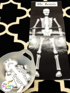 Plan the ultimate Halloween classroom party with this list of fun Halloween party stations, complete with Halloween crafts, Halloween treats, Halloween games, and more! Your preschool, kindergarten, and 1st grade students will love rotating between these Halloween activities for kids! Students will complete a mummy craft, Room on the Broom craft, and monster glyph craft. They will play Halloween bingo and Halloween charades! And, don't forget the Halloween snacks and DIY Halloween party games!