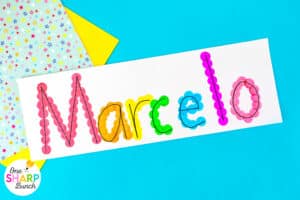 Strengthen fine motor skills while learning names during back to school with this simple bingo dauber name craft! This rainbow name craft is perfect for preschool and kindergarten name activities and name practice activities. Great back to school activities and back to school crafts, it also creates a bright back to school bulletin board. An easy name activity that doubles as engaging fine motor name activities for centers or small groups!
