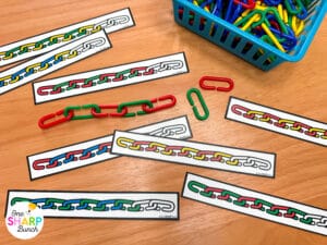 Learn how to launch kindergarten centers at the beginning of the school year with 3 simple steps. Discover how to introduce center manipulatives, teach center routines and procedures, and build student independence so your centers run smoothly all year long. These top teacher tips for launching kindergarten centers will allow you to meet with small groups while students work independently on math centers and Science of Reading-aligned literacy centers. Learn more about successfully launching kindergarten centers!