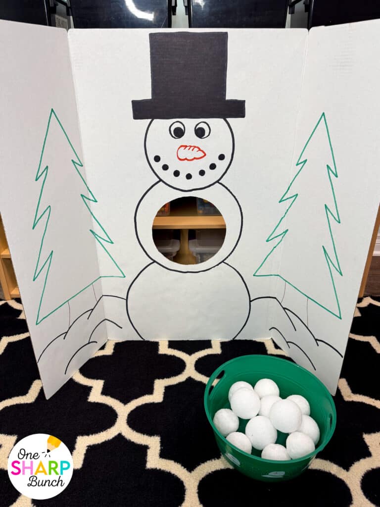 Throw an unforgettable classroom holiday party with these simple and inexpensive DIY Christmas party games for kids! These classroom winter party games include a snowman toss, snowman bowling, and jingle bell drop. All are great for strengthening fine motor skills while celebrating before winter break. Learn more about incorporating these classroom Christmas games for kids and Christmas activities into your classroom Christmas party stations!