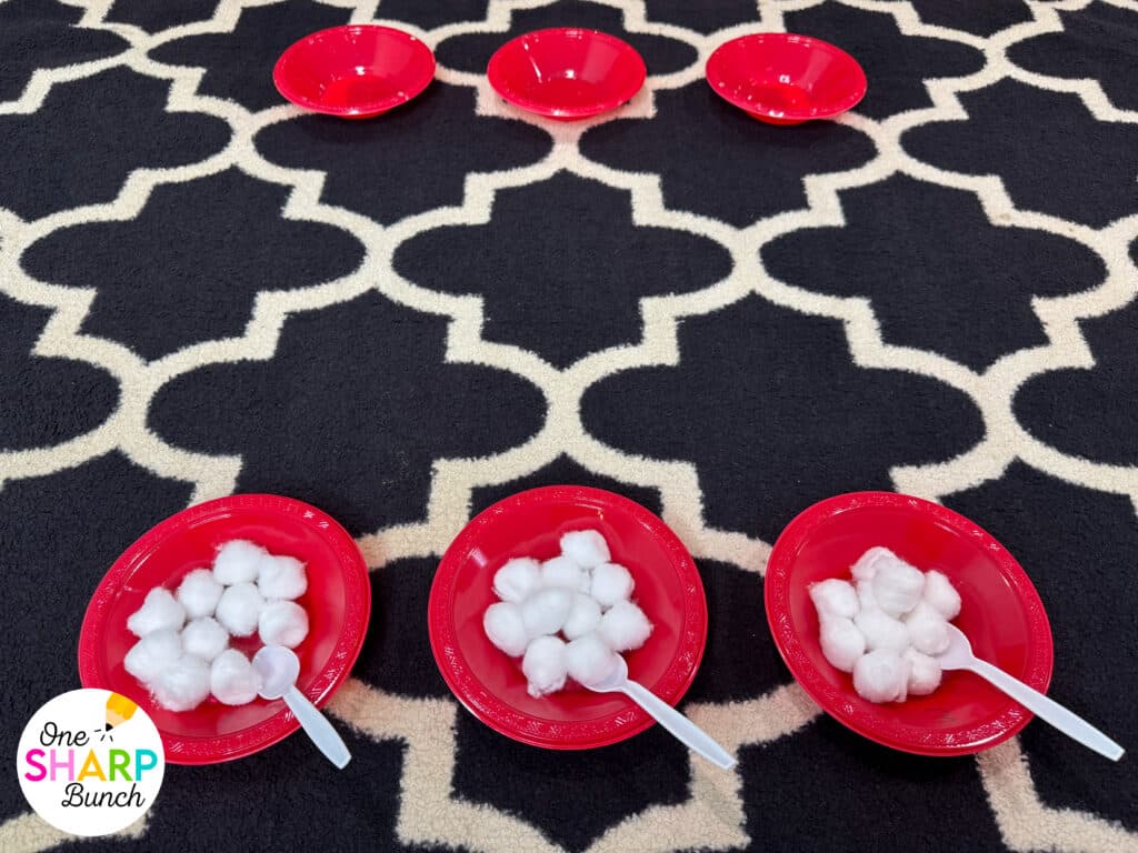 Throw an unforgettable classroom holiday party with these simple and inexpensive DIY Christmas party games for kids! These classroom winter party games include a snowman toss, snowman bowling, and jingle bell drop. All are great for strengthening fine motor skills while celebrating before winter break. Learn more about incorporating these classroom Christmas games for kids and Christmas activities into your classroom Christmas party stations!